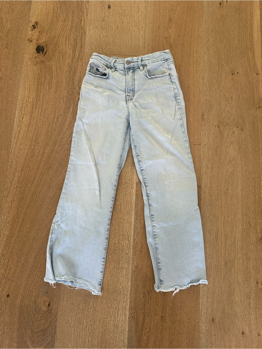 Good American light distressed jeans, flattering fit